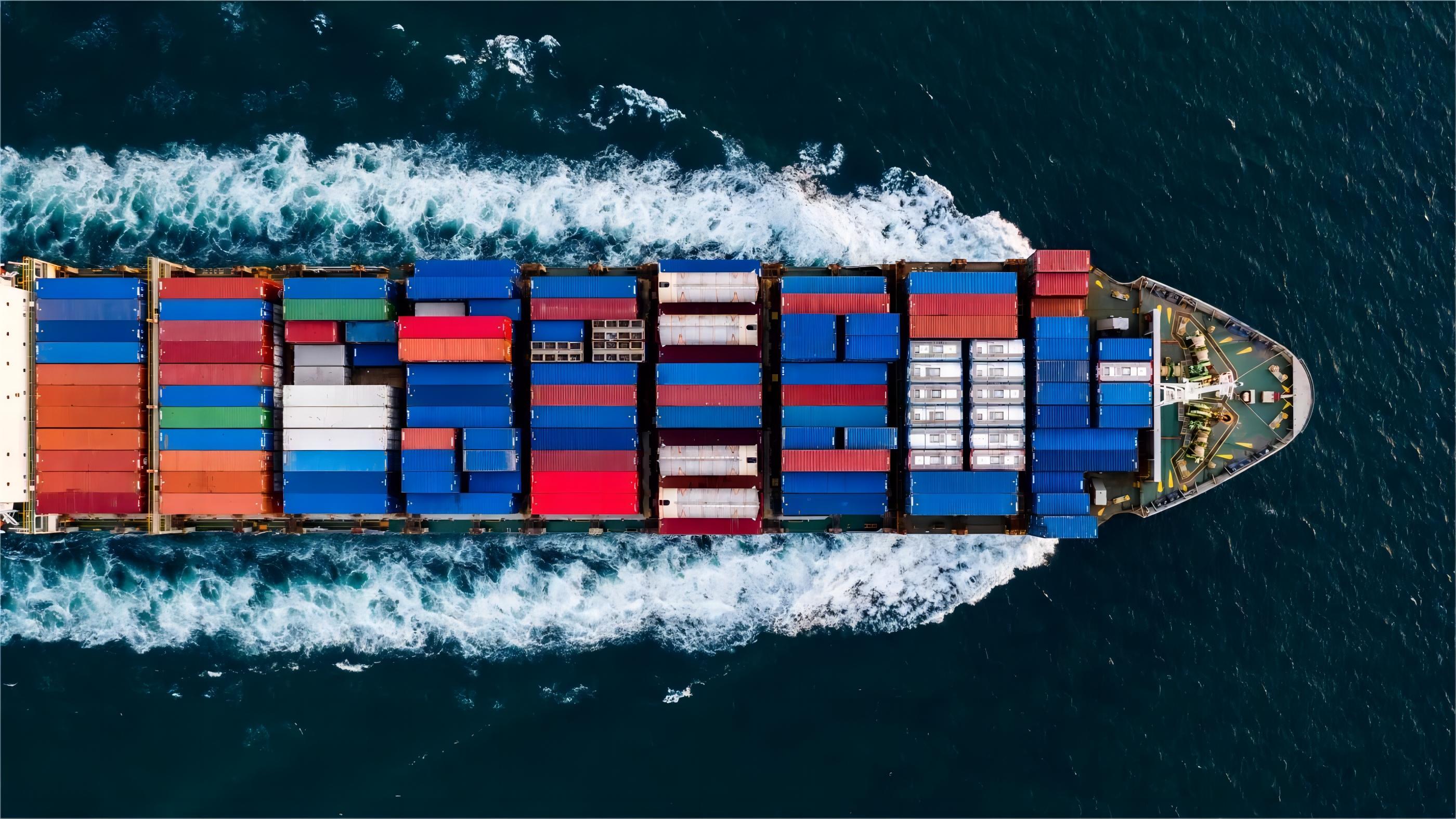 Shipping containers stacked at a port in China, ready for FCL shipping