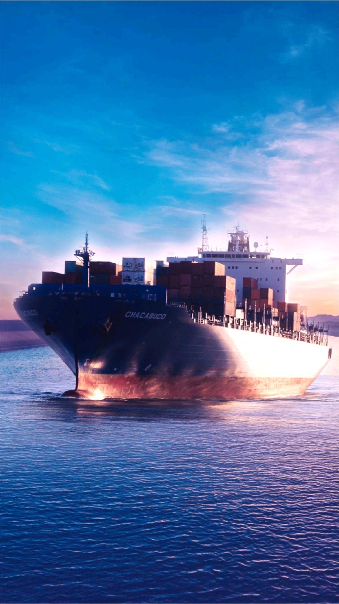 Cargo ship loaded with containers sailing towards Indonesia